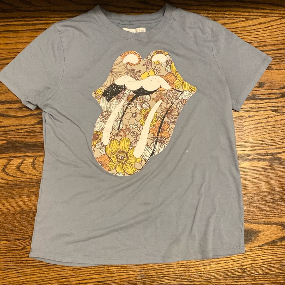 A blue Rolling Stones shirt